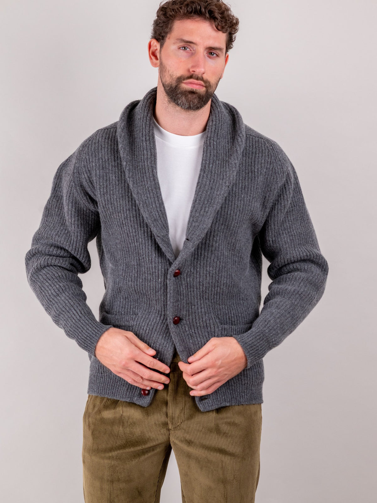 Brisbane Moss corduroy trousers in Drab, khaki cotton, worn by a model — John Crocket