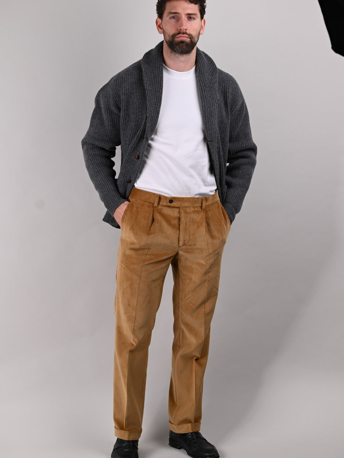 Brisbane Moss corduroy trousers in Fawn, sandy brown cotton, worn by a model — John Crocket