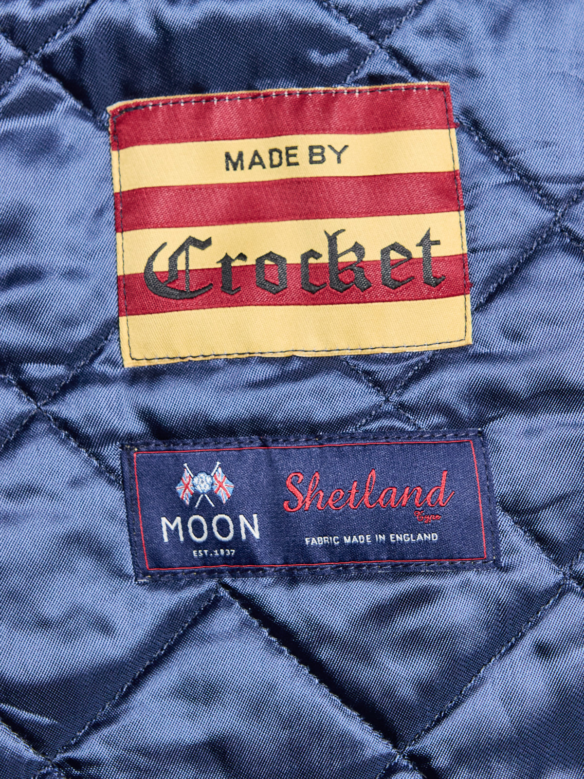 Oxford Jacke Fischgrät Moon Tweed Forest gestepptes Innenfutter mit Crocket- und Moon-Etikett — John Crocket