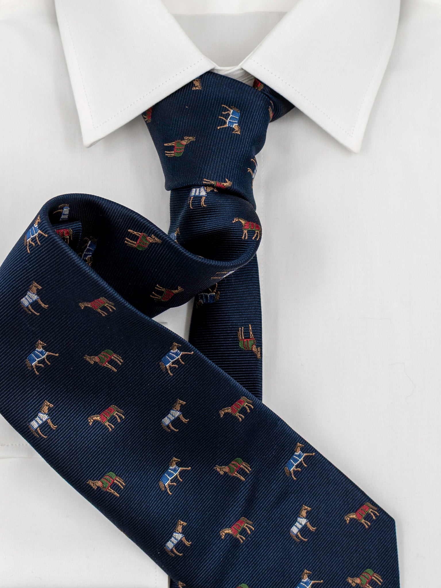 Tie with horses in navy