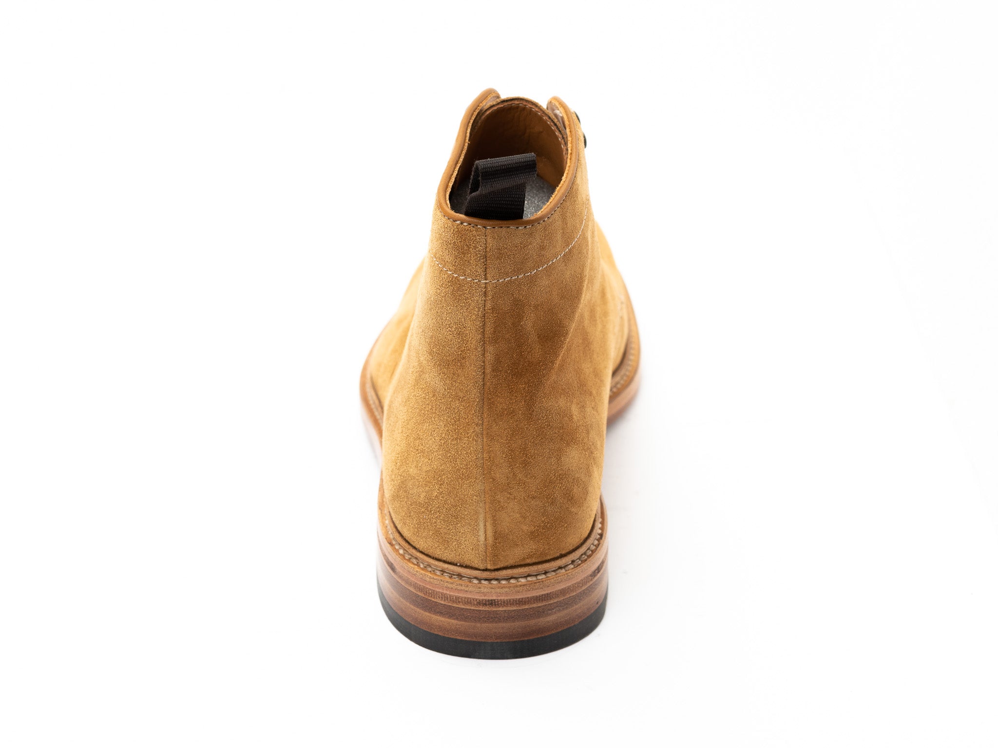 Boots in lightbrown suede leather with a leather sole