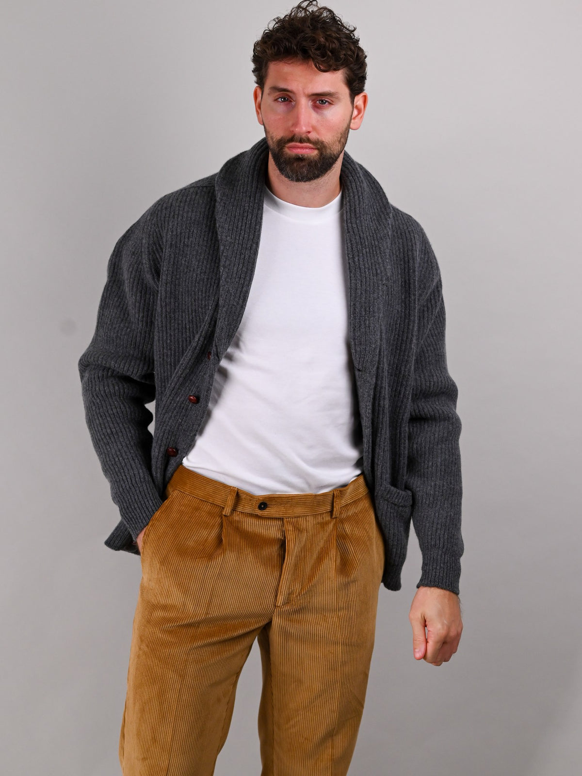 Brisbane Moss corduroy trousers in Fawn, sandy brown cotton, worn by a model — John Crocket