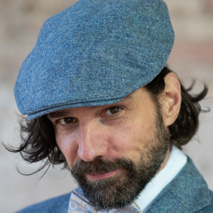 Tweed cap in red melange made from Moon Tweed