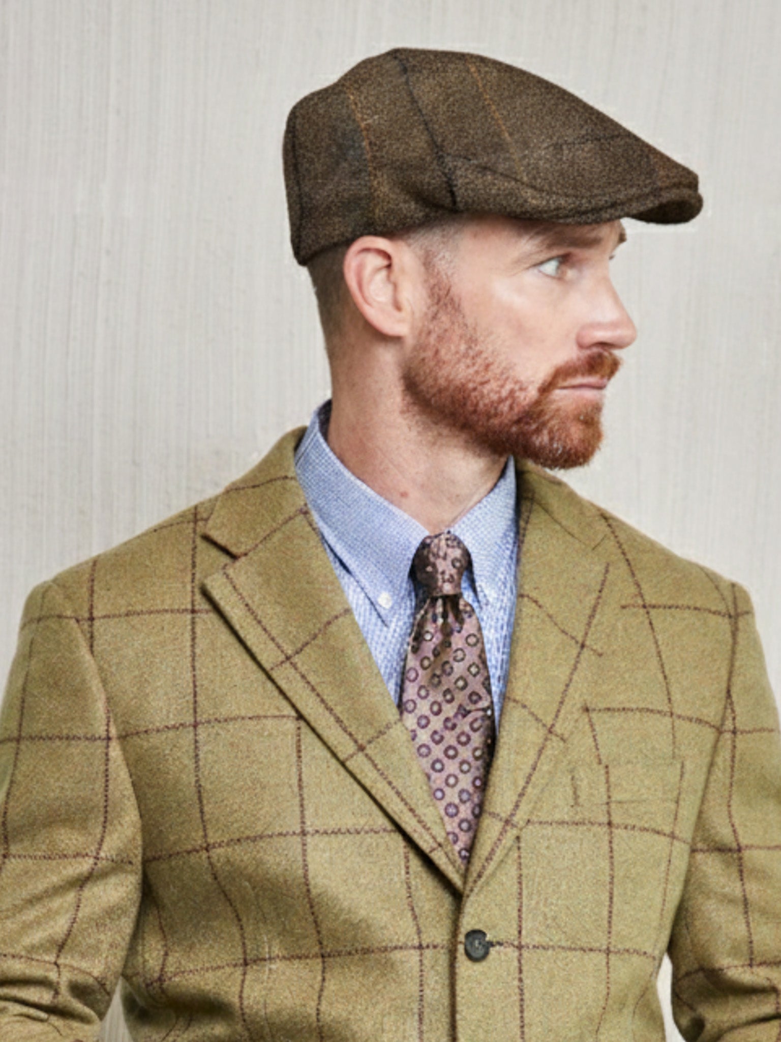 Tweed cap in red melange made from Moon Tweed