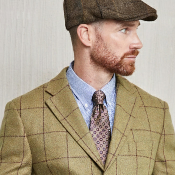 Tweed cap in red melange made from Moon Tweed