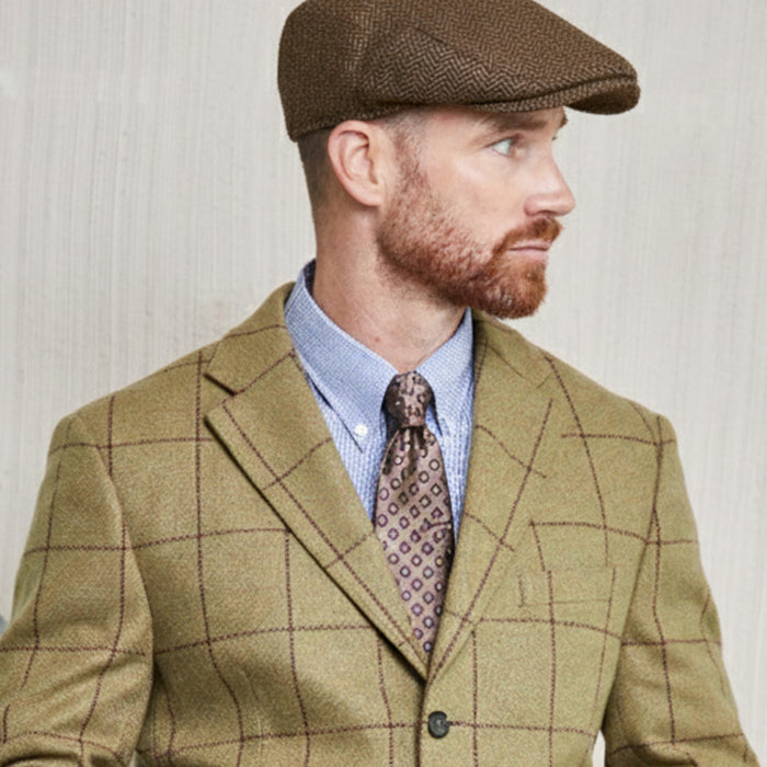 Tweed cap in red melange made from Moon Tweed