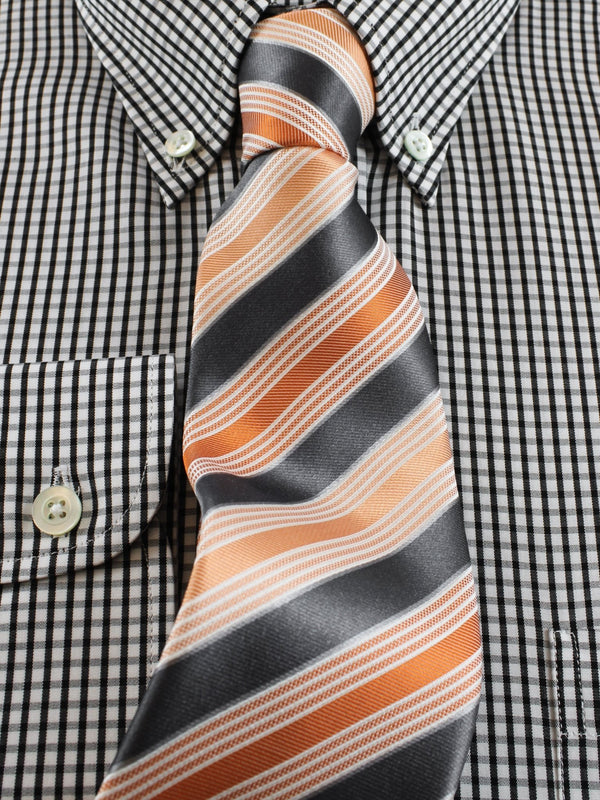 Silk tie striped in orange/grey, detail view