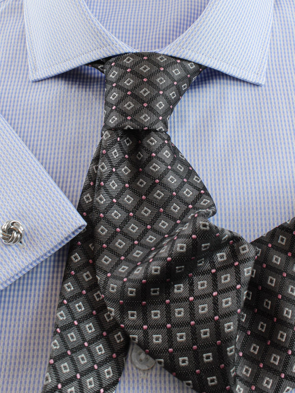 Silk tie patterned in grey, detail view