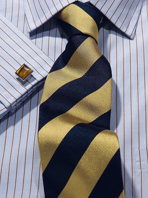 Krawatte: Krawatte mit Clubstreifen in navy/gelb | John Crocket – Fine British Clothing